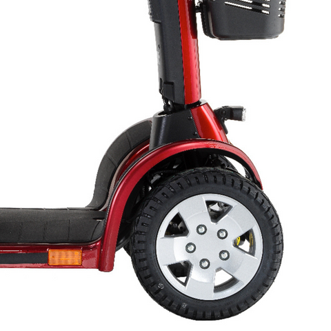 Close-up of the large 13-inch pneumatic front wheels of the Colt Pursuit scooter, designed to provide excellent performance and outdoor capability.