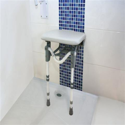 Comfortable shower seat fitted to the wall.